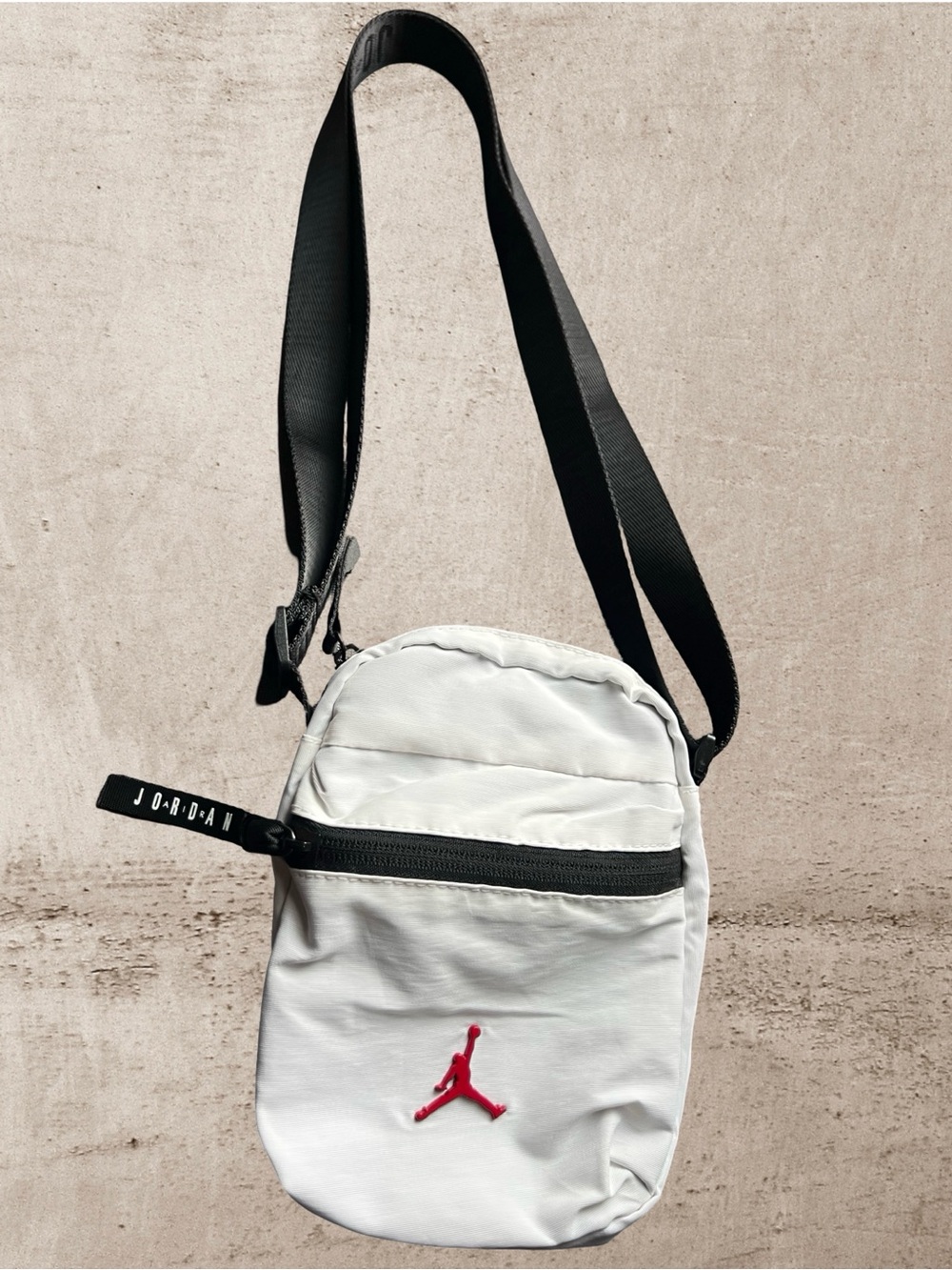 Jordan White Crossbody Bag with Black Strap and Red Logo